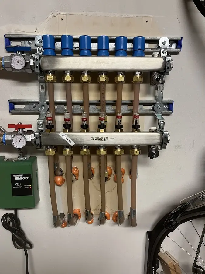 Plumber performing Gas Line Installation at a residential property in Amherst